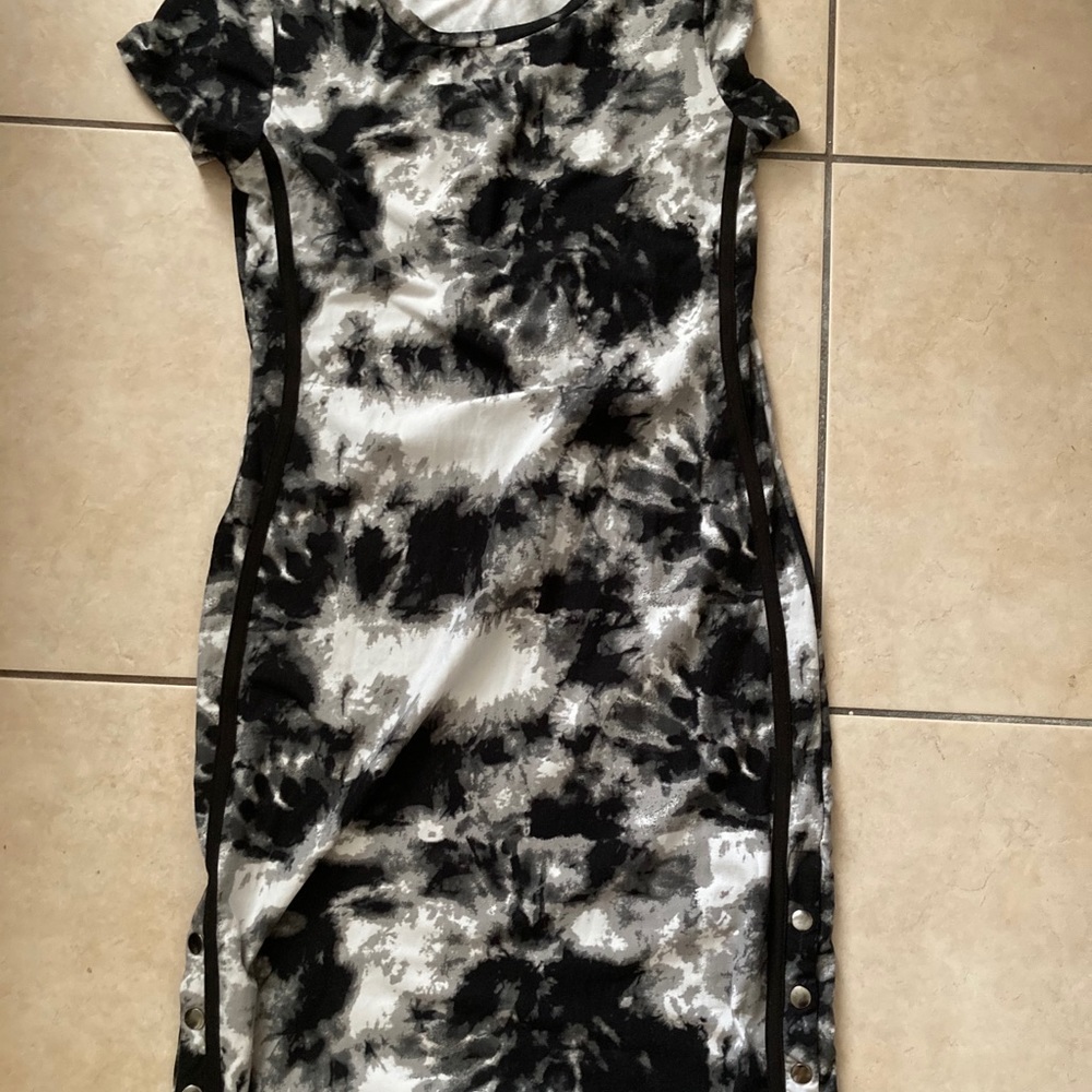 Oddly patterned dress.